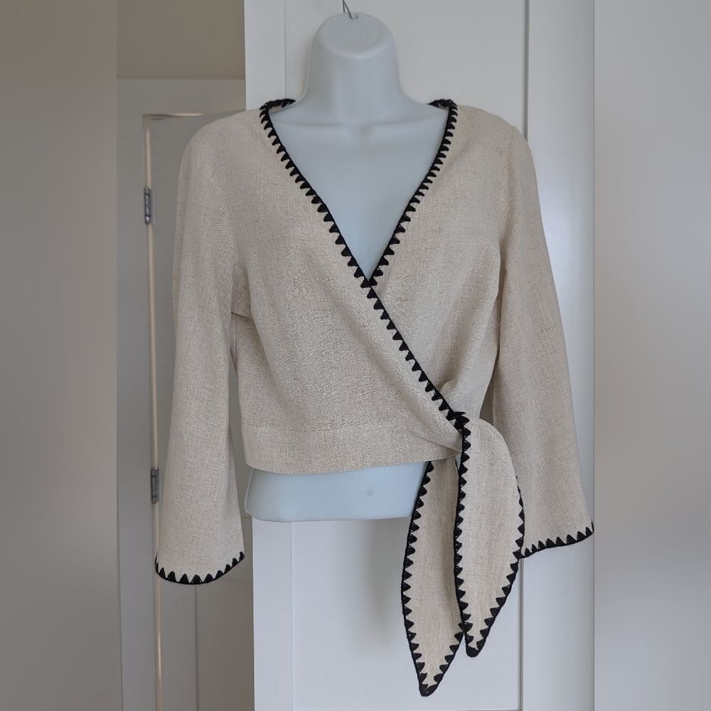 Lulu's Allamenda Beige Wrap Blouse with Black Edging. Small - Picture 5 of 6